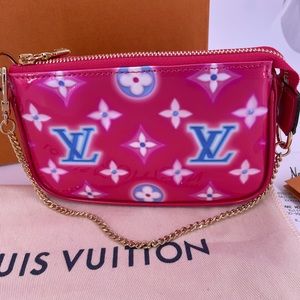 Sold Out- authentic Louis Vuitton Valentine 2022 mini pochette New in box.